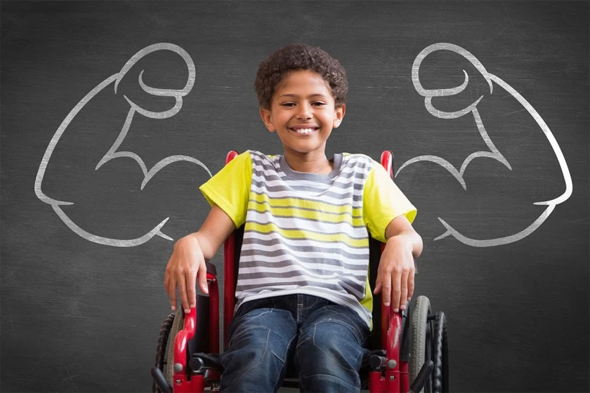 A boy with cerebral palsy radiating joy with a bright smile